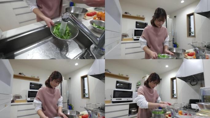 女人在厨房洗莴苣吃午饭-第2部分，共2部分