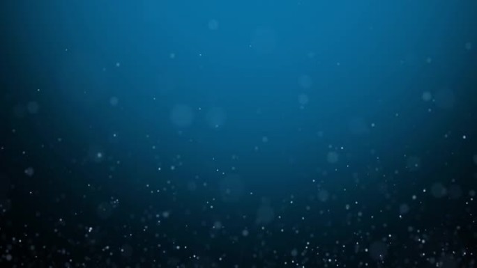 艺术深蓝色bokeh水泡粒子复制空间动画背景。