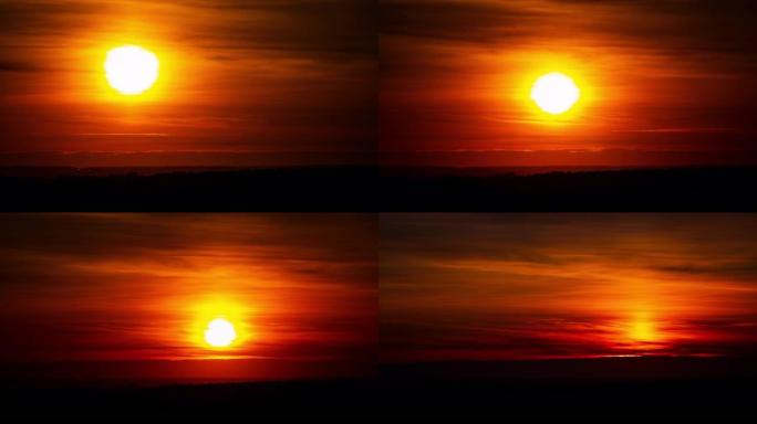 时间流逝明亮的橙色日落太阳落在云层后面