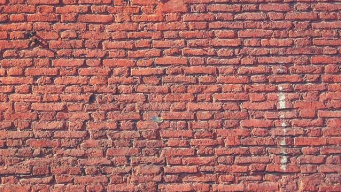 红砖墙面纹理无缝循环。混凝土砌块墙背景。