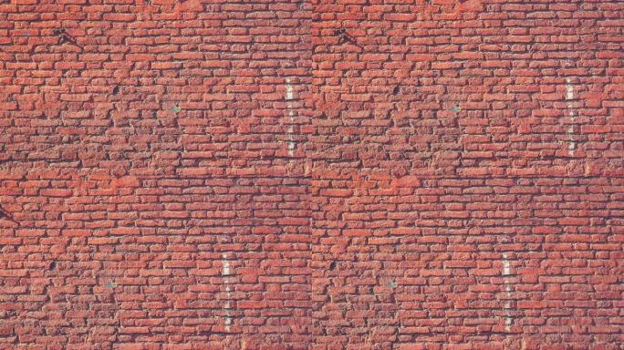 红砖墙面纹理无缝循环。混凝土砌块墙背景。