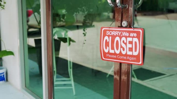 商业咖啡馆关闭不能开始销售，因为病毒covid 19。业主小企业在受到疫情病毒的长期影响后关闭了一家