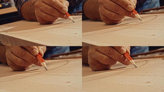 一位资深木匠的SLO MO用铅笔在木头上绘制设计