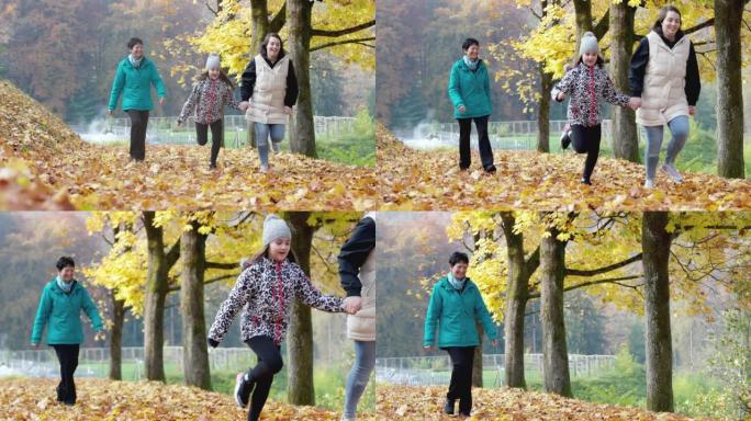 在阴天的秋天，两个年轻的高加索女孩在与祖母散步时逃跑了