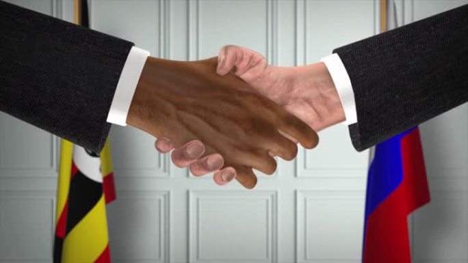 乌干达与俄罗斯的协议握手，政治说明。正式会议或合作，商务见面。商人和政客握手