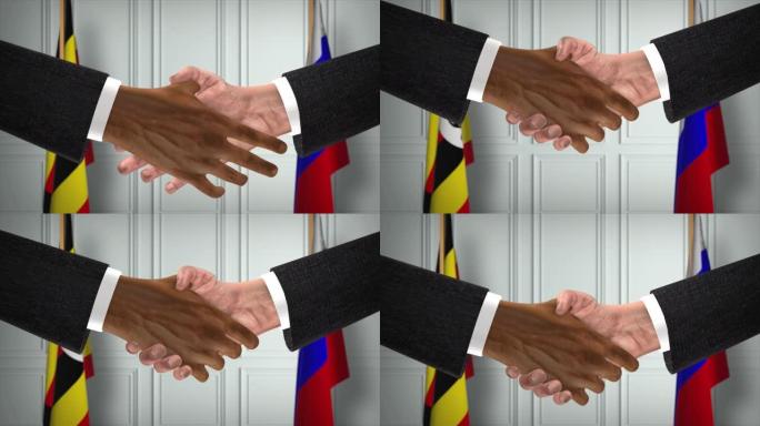 乌干达与俄罗斯的协议握手，政治说明。正式会议或合作，商务见面。商人和政客握手