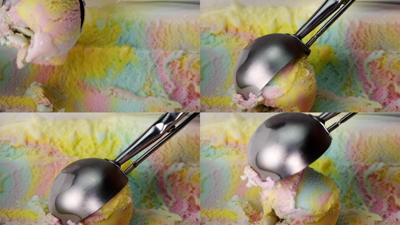 在表面顶部舀彩虹冰淇淋。