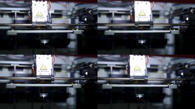 FDM 3d打印机的头打印塑料模型。增材技术。特写