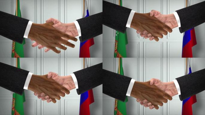 土库曼斯坦与俄罗斯交易握手，政治说明。正式会议或合作，商务见面。商人和政客握手
