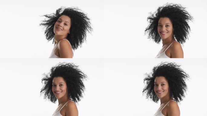 黑色卷发的非裔美国年轻女子抬头