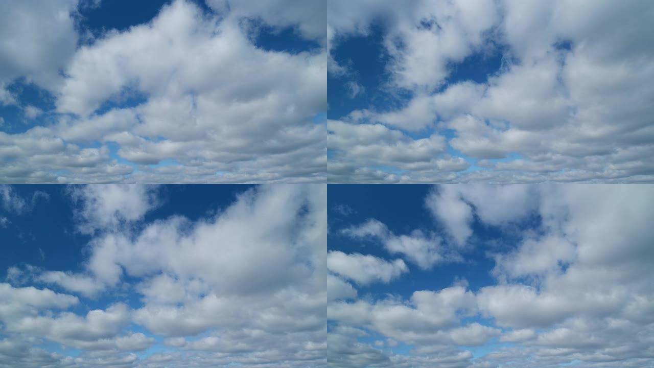 云层积云自然背景。蓝天，云彩和阳光。通风云景的自然背景。延时。