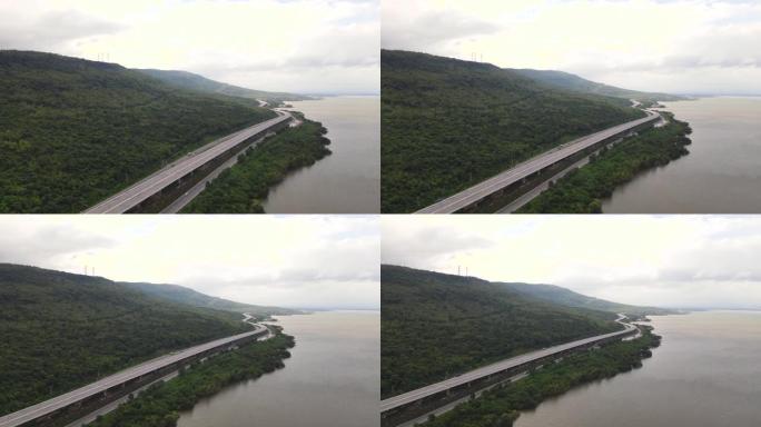城市之间的高速公路鸟瞰图，高速公路穿过湖泊和山脉