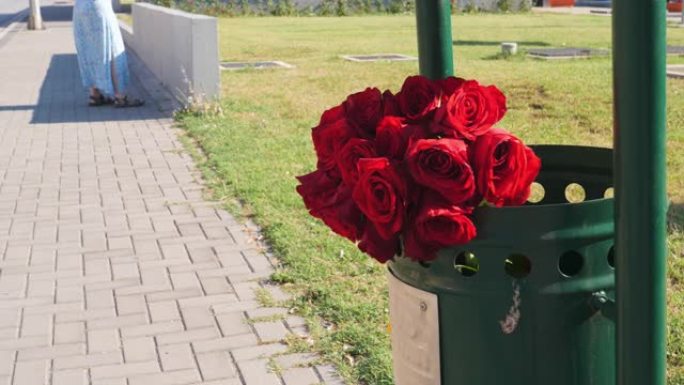 垃圾桶里丢弃的玫瑰，分手，失败的约会或单恋场景