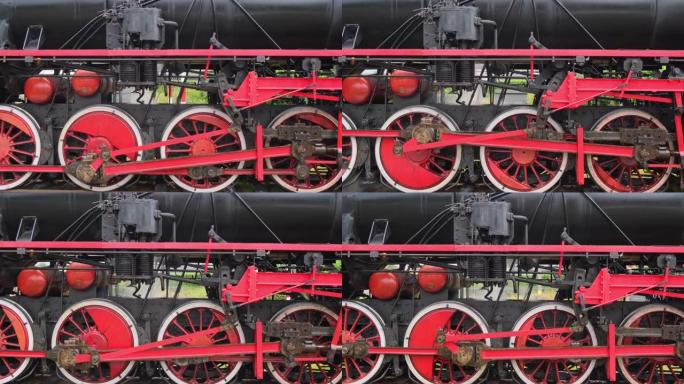 老式蒸汽火车机车车轮的跟踪镜头