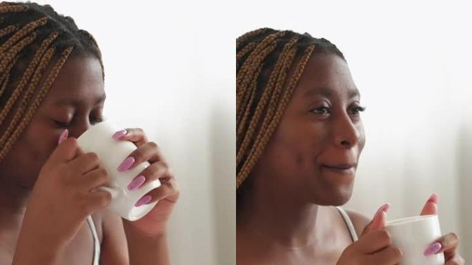 垂直视频早晨能量女人喝茶