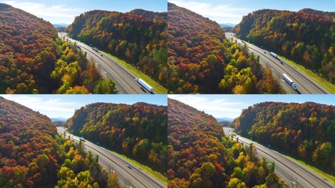 北卡罗莱纳州I-40高速公路的鸟瞰图，在金色的秋天通过阿巴拉契亚山脉前往阿什维尔，卡车和汽车正在移动