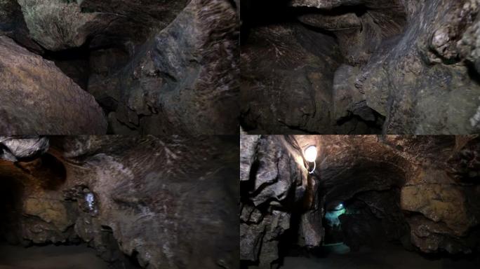 摄像机通过一条非常黑暗的隧道进入黑暗的移动。