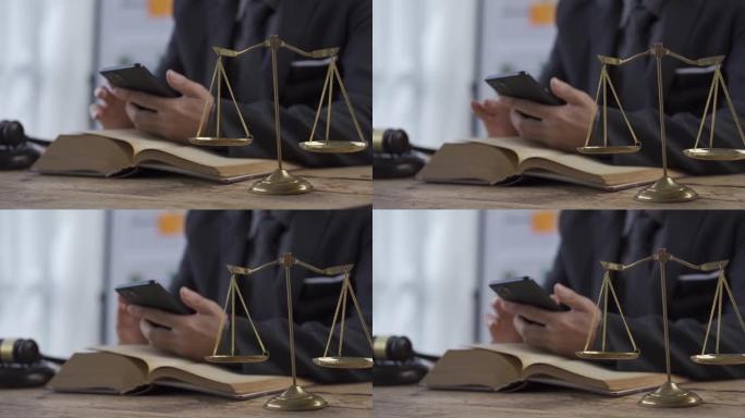 在线咨询概念，律师使用智能手机在办公室咨询