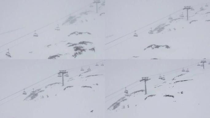 安装升降椅，将滑雪者运送到深谷上，而滑雪道外面下雪又有雾