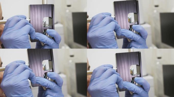 科学家使用调节夹具和放大镜从LC MS qTOF系统检查雾化器针的状况