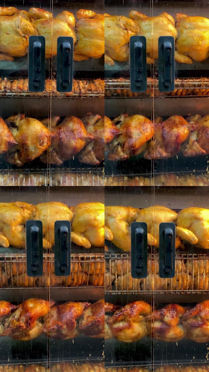 在餐厅或街头市场的电烤炉上旋转美味的烤鸡和火鸡。酥脆、油炸、不健康的快餐。