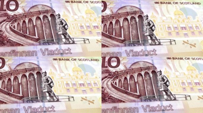 苏格兰苏格兰镑10钞票，十苏格兰镑，苏格兰镑的特写和宏观视图，跟踪和多莉镜头10苏格兰镑钞票观察和储