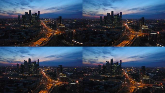 俄罗斯日落夜照明莫斯科城市交通道路空中全景4k