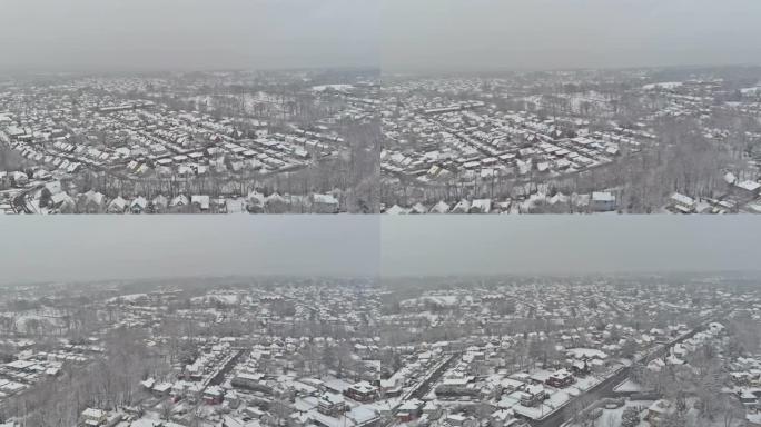 奇妙的冬季风景屋顶房屋在小城雪景后的居民街道上覆盖积雪