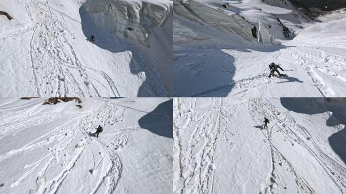 男性滑雪者自由骑行在融化的雪滚动的雪鹅卵石极限运动鸟瞰图