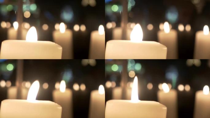 降临节白色蜡烛上的旋转装饰由胶合板制成，描绘天使或圣诞树15p1