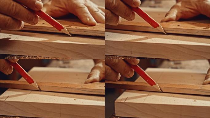 SLO MO DS男性用尺子在木头上画一条直线