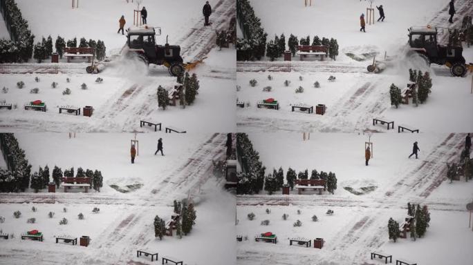 拖拉机用旋转刷子和扫雪机从桥上的行人专用区扫雪，暴风雪期间的人行道积雪管理。扫雪机服务清除道路上的冰