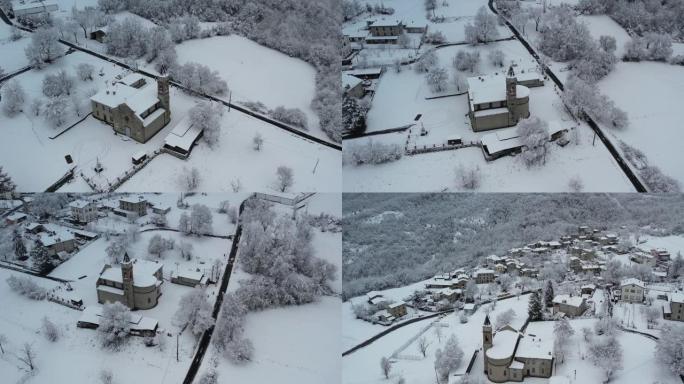 意大利皮亚琴察韦尔纳斯卡城堡上空的冬季暴风雪，被积雪覆盖，当地教区的无人机航拍视频