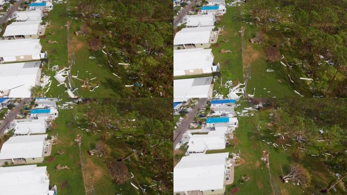 4k无人机视频显示佛罗里达州北港被飓风伊恩摧毁的房屋中的森林碎片-18