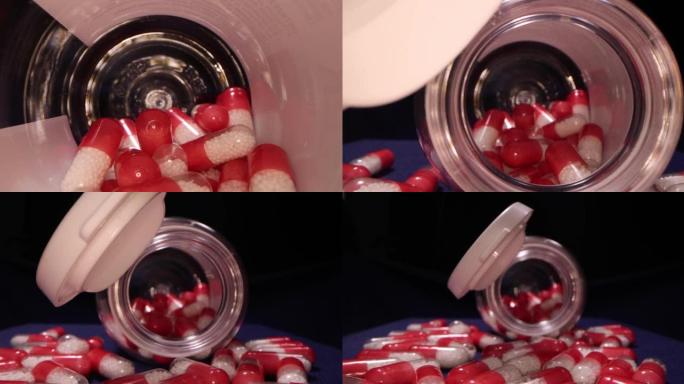 注射医用处方药，阿片类止痛药。移动的视图，红白药丸在瓶子里。治疗药理学概念。