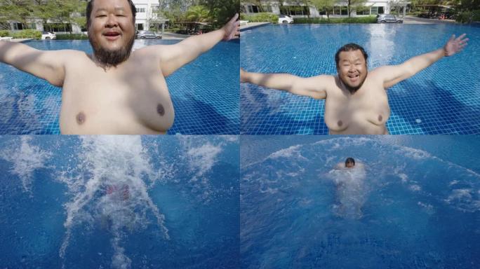 赤膊超重的亚洲人穿着红色短裤微笑着向后掉进游泳池