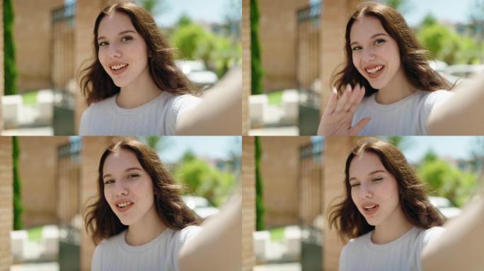 年轻女子微笑着自信地在街上进行视频通话