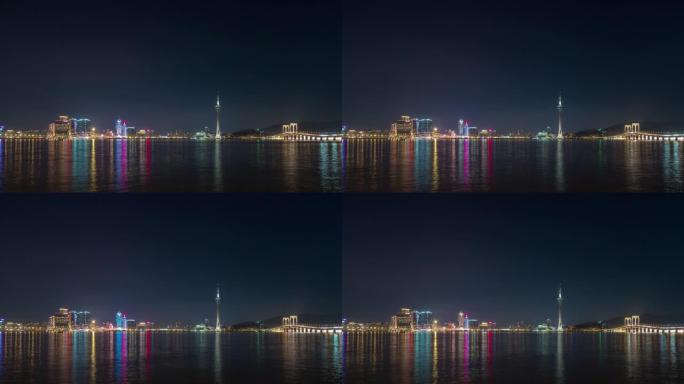 夜间照明著名的澳门城市湾全景延时4k中国