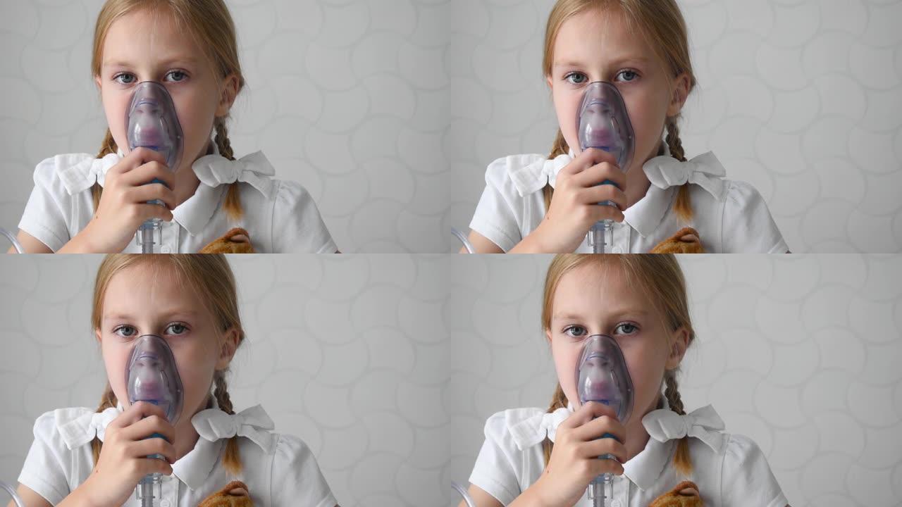白人小女孩的特写镜头用医用雾化器吸气