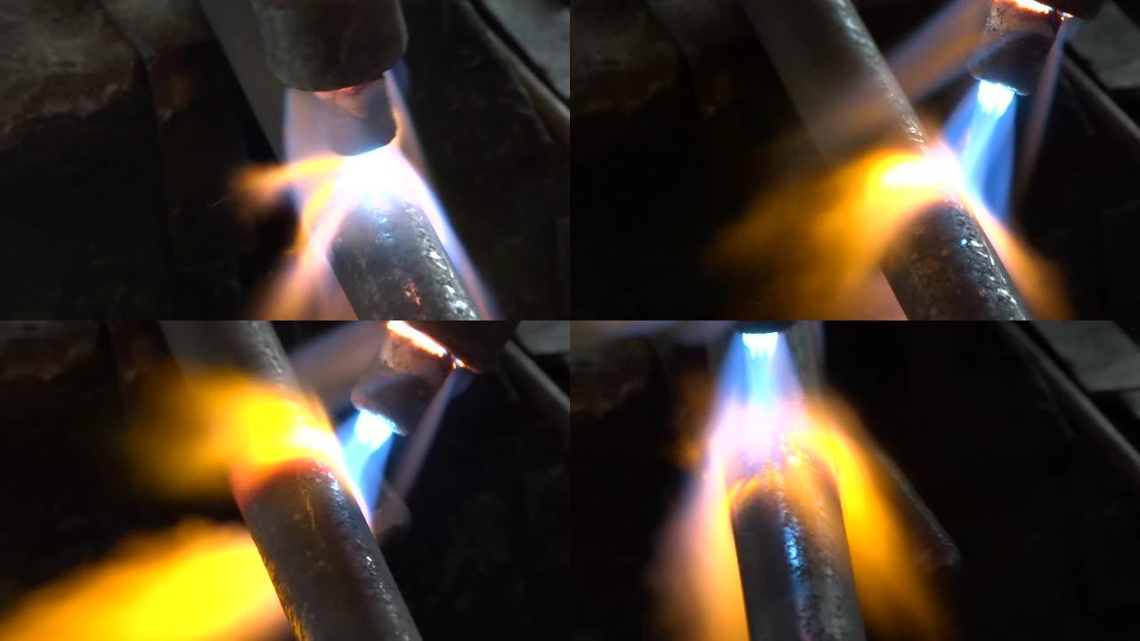铜管自焊的特写，故障家庭集中供热系统的紧急补焊