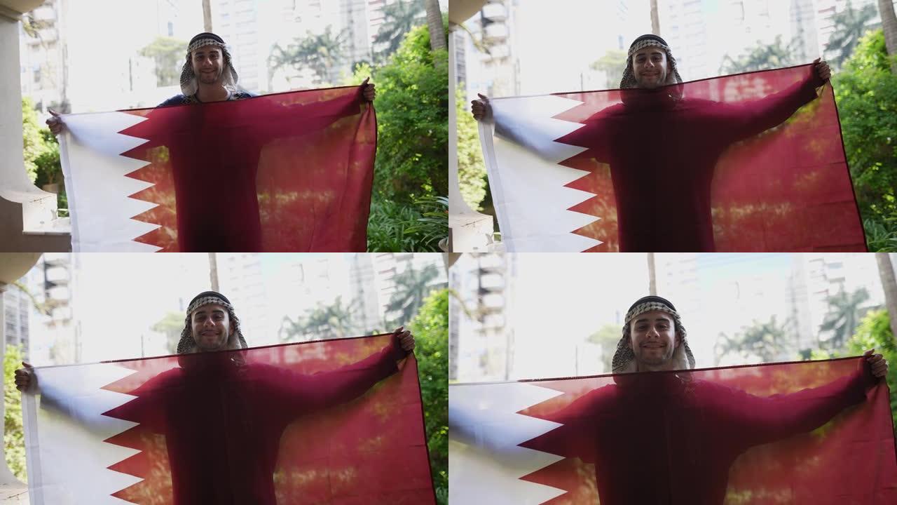 一位带有卡塔尔国旗的年轻人的肖像
