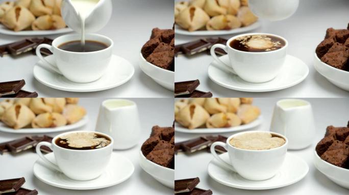 将牛奶罐中的奶油倒入咖啡中，用奶油，卡布奇诺咖啡煮咖啡。