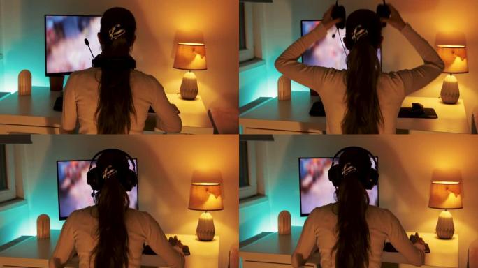 女玩家正在PC上玩激动人心的视频游戏