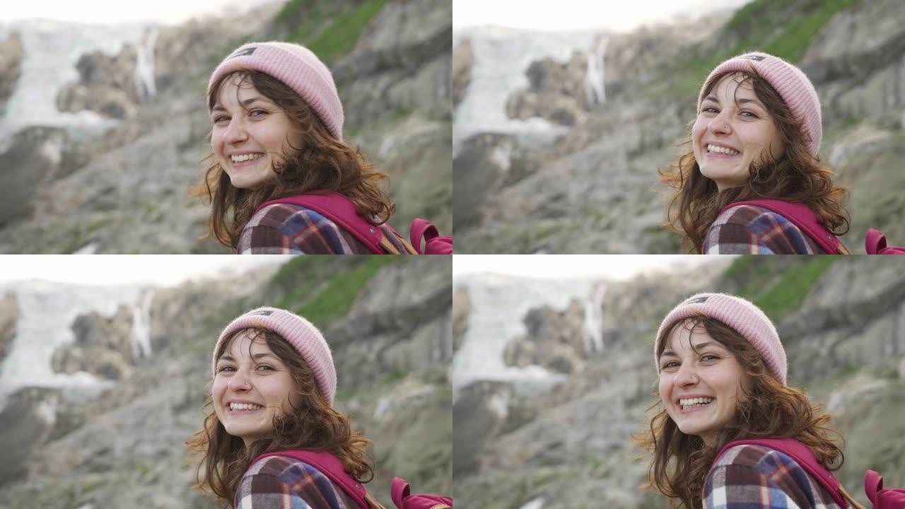 Jostedalsbreen冰川背景下的微笑女人