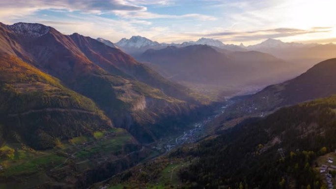 日落时欧洲阿尔卑斯山山谷的超流空中