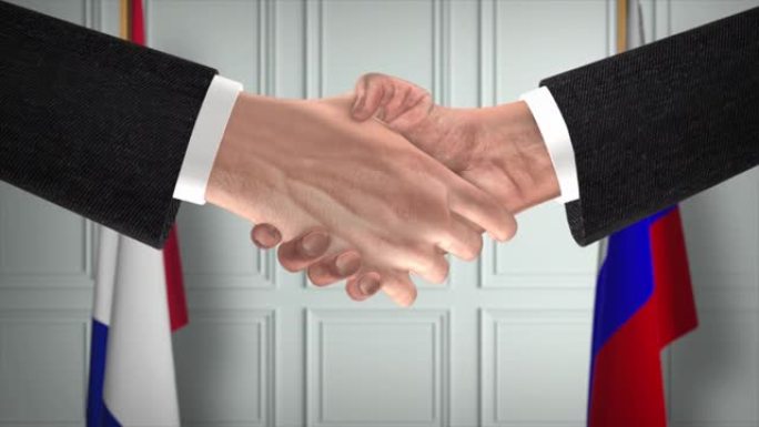 法俄协议握手，政治说明。正式会议或合作，商务见面。商人和政客握手