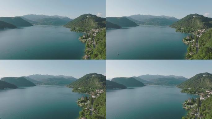 夏季晴天，高山湖被群山环绕