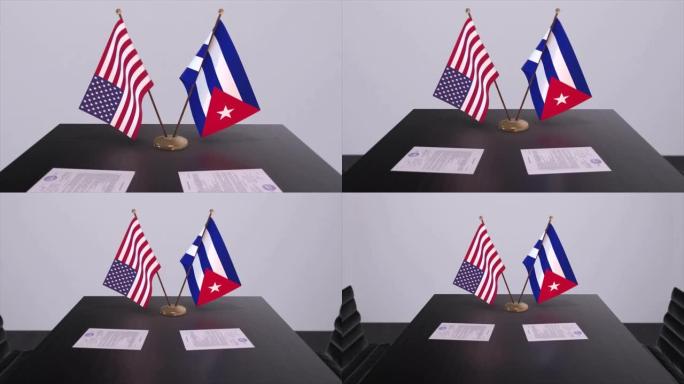 古巴和美国在谈判桌上达成外交协议。商业和政治动画。国旗，外交协议。桌上的纸质文件。国际协议。