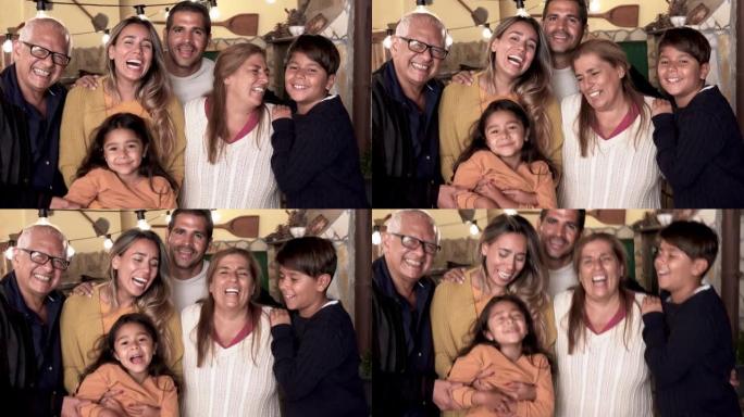 相机上微笑的快乐拉丁家庭-家庭爱情的概念