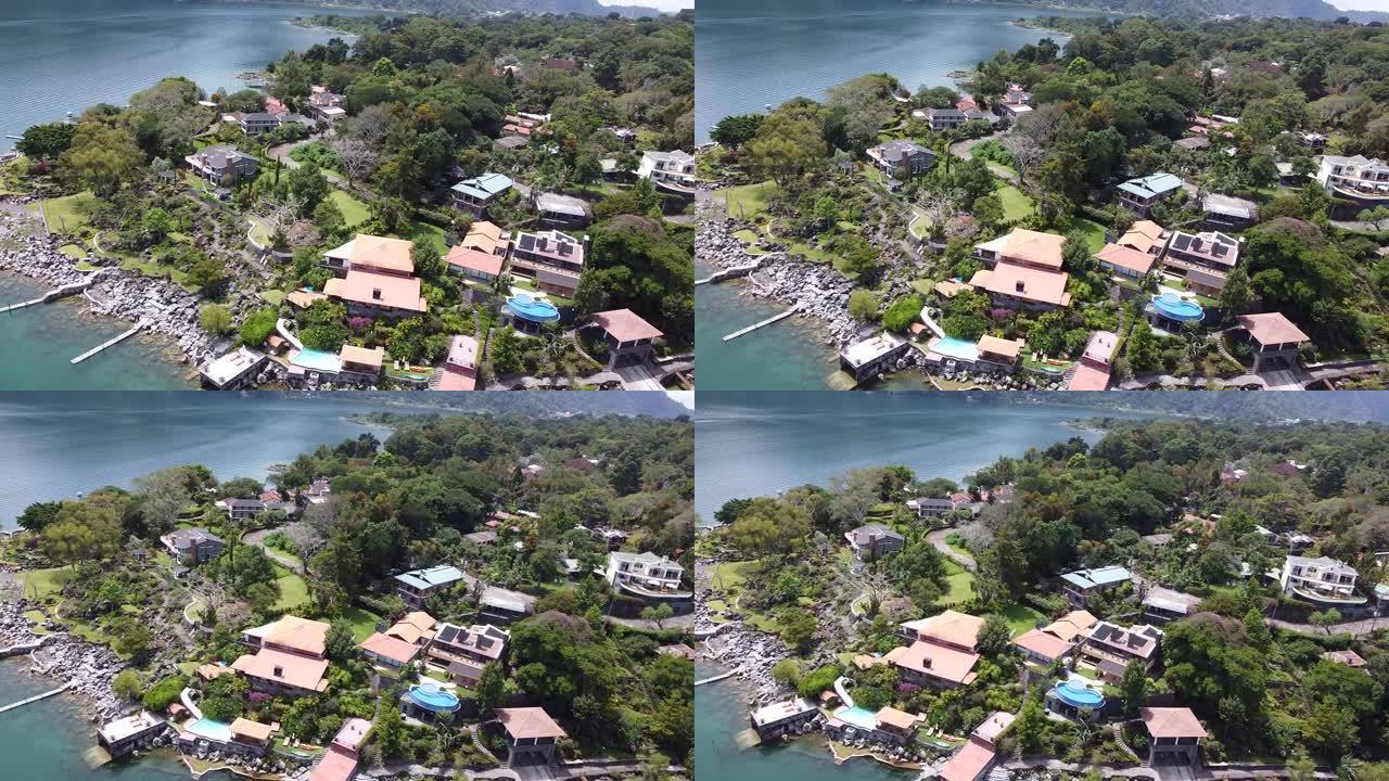 无人驾驶飞机拍摄湖岸的房屋和别墅